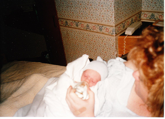 Mom Feeding newborn Travis
